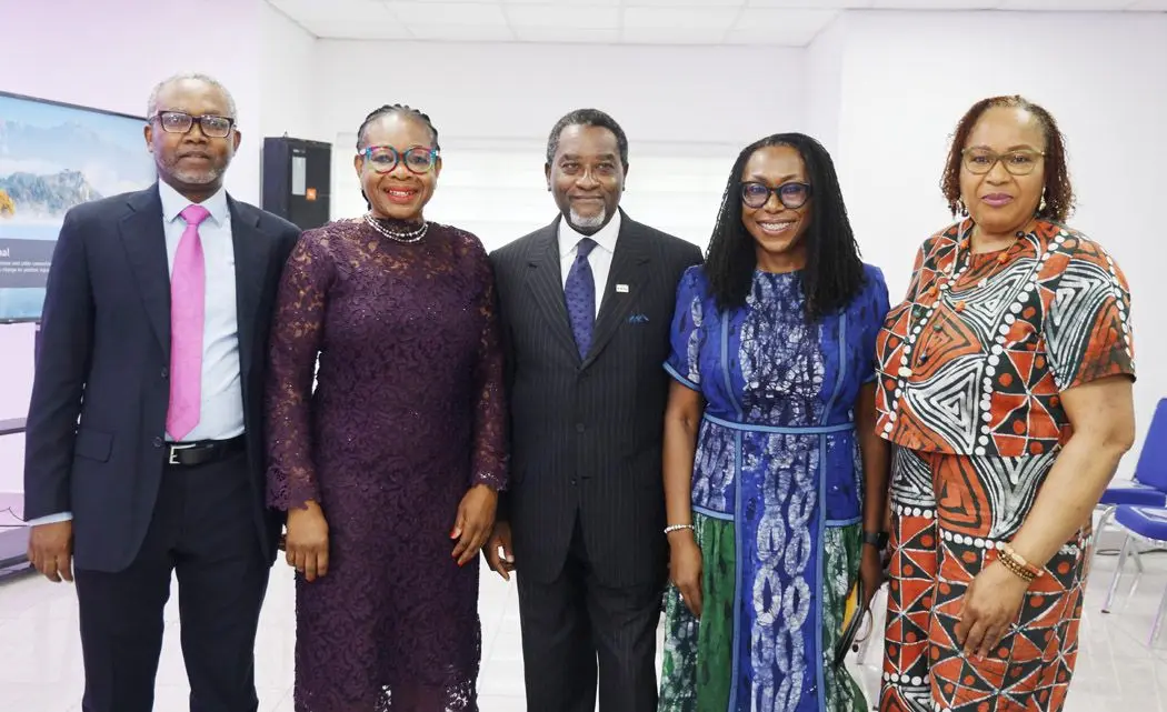 Abimbola Olashore in a group meeting photo